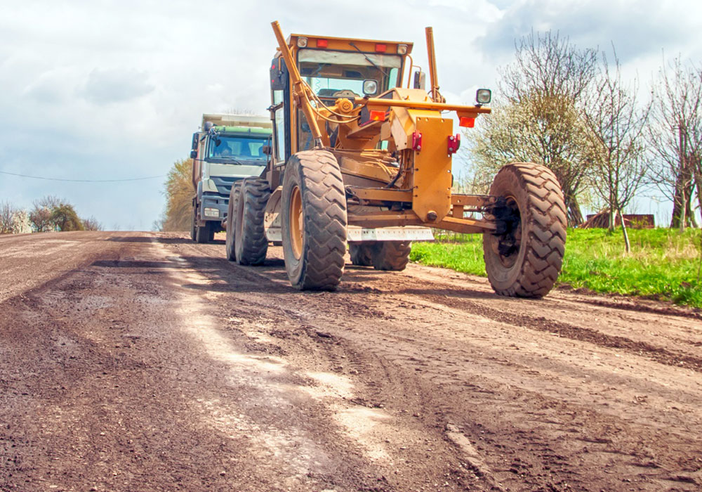 Site grading and preparation equipment for paving work